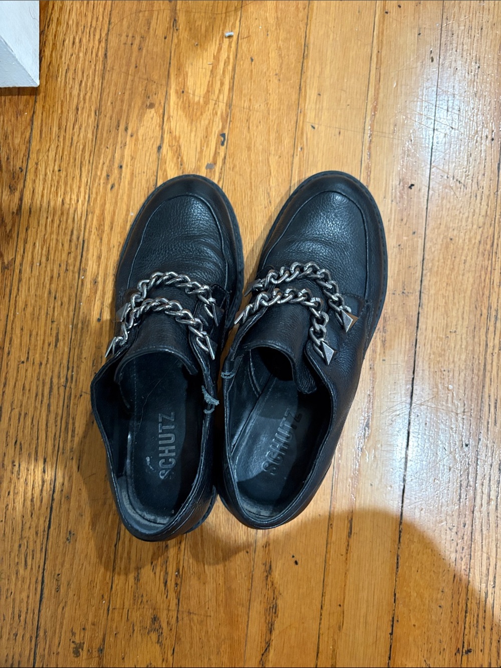 SCHUTZ Black Leather Slip-On Loafers with Silver Chain
